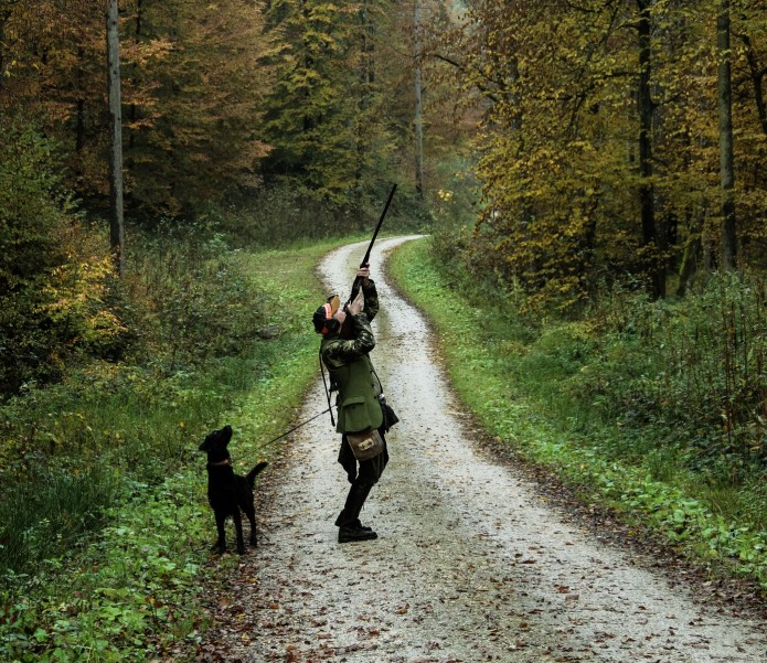 Jäger mit Hund der schiesstjpeg